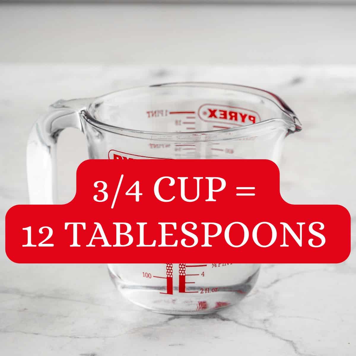 ¾ cup glass of water with text overlay: ¾ cup equals 12 tablespoons.