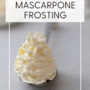 Mascarpone frosting piped on a spoon: Pin with text.
