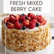 Decorated fresh berry cake on a plate: pin with text.
