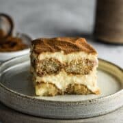A single slice of Italian tiramisu on a plate.