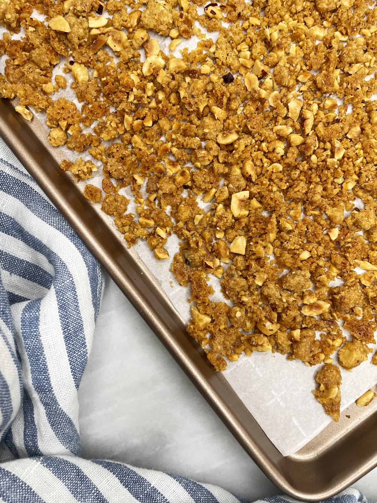 Baked crumble topping on a baking sheet