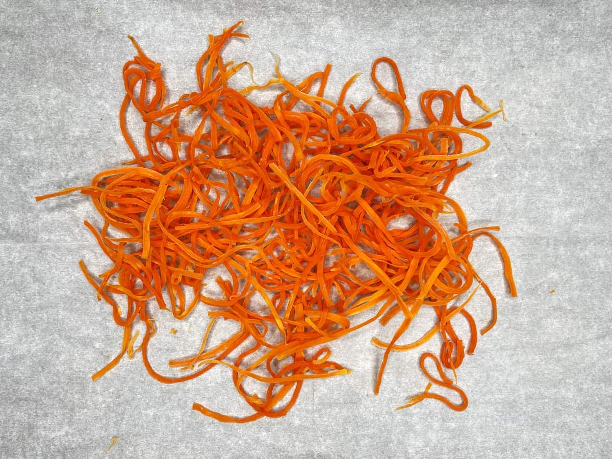 Dried carrot topping on parchment 