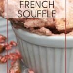 French souffle with a teaspoon into the ramekin and almonds in the background: Pin with text.