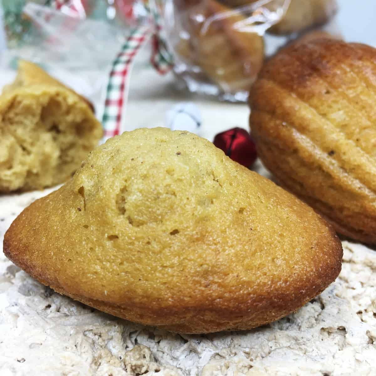 Gingerbread madeleines with a bag of these cakes in the background