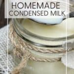 Homemade condensed milk with a spoon in a jar: Pin with text.