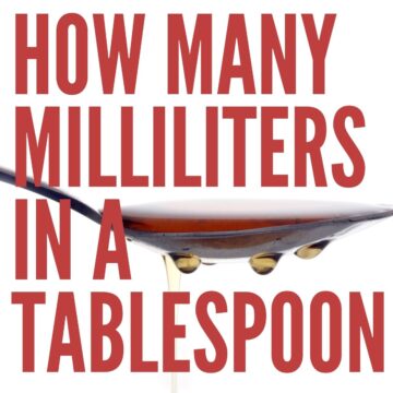 A tablespoon with red fluid and overlaying text