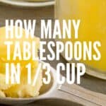 A measuring tablespoon and a glass jar with ghee: Pin with text.