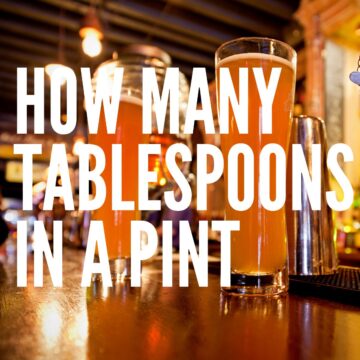 Pints of beer on the pub's counter.