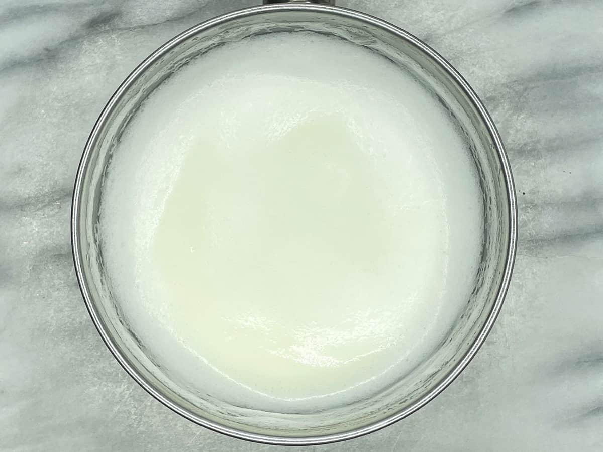 Milk sugar mixture in a saucepan