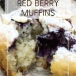A halved muffin dusted with icing sugar featuring triple mixed berries: Pin with text.