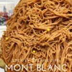 Mont Blanc cake covered with chestnut vermicelli, a cup, glasses on a table: Pin with text.
