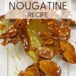 Nougatine decoration on parchment paper: Pin with text.