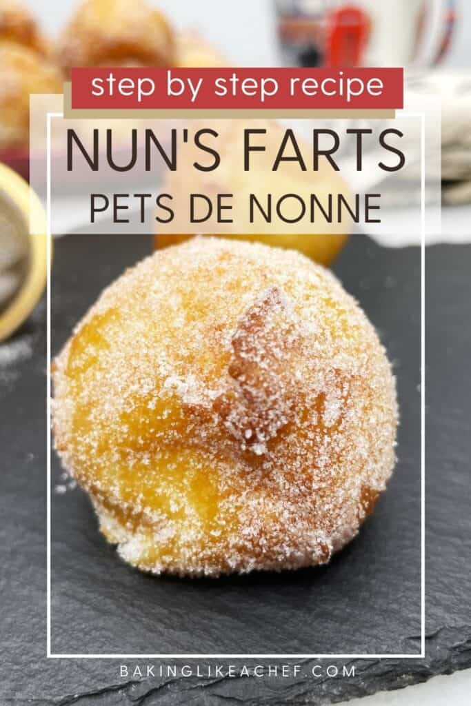 Nun's fart or beignet donut covered with sugar on a back serving board: Pin with text