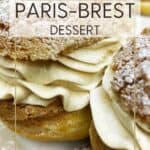 Paris-Brest dessert filled with praline mousseline cream and dusted with icing sugar: Pin with text.