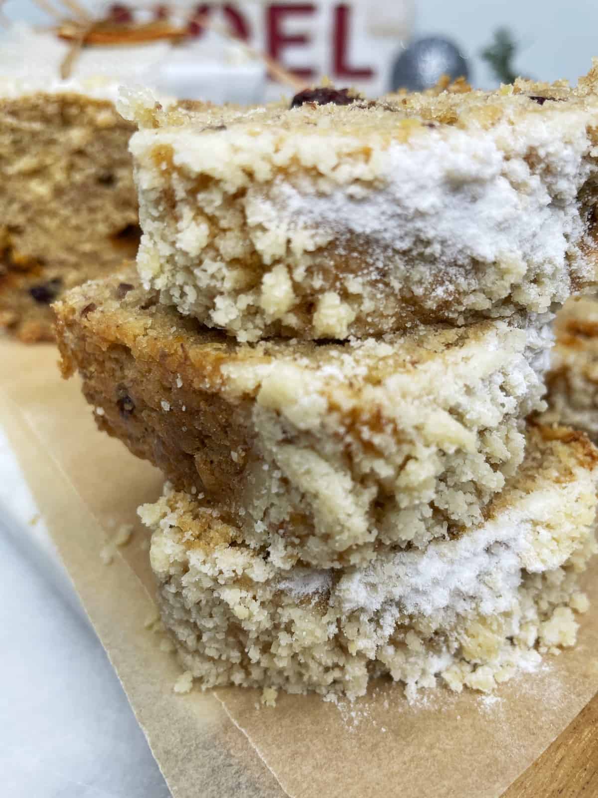 Stacked Christmas banana bread slices on a serving platter