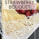 Bouquet of strawberries held in the hand: Pin with text.