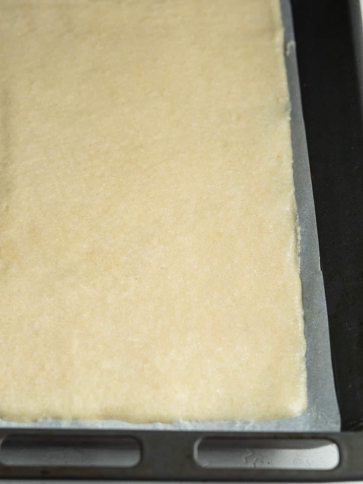 Cake batter onto a baking sheet 