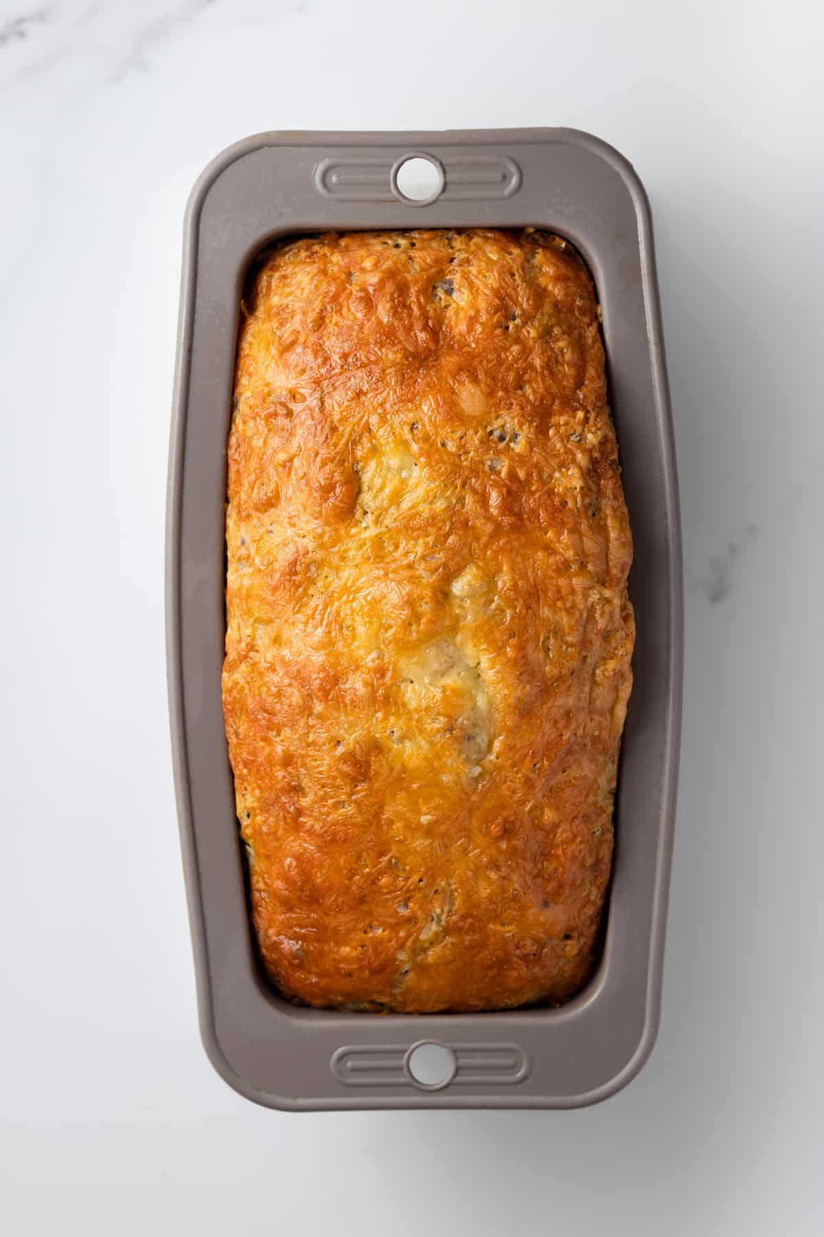 Baked French savory cake in a mold.