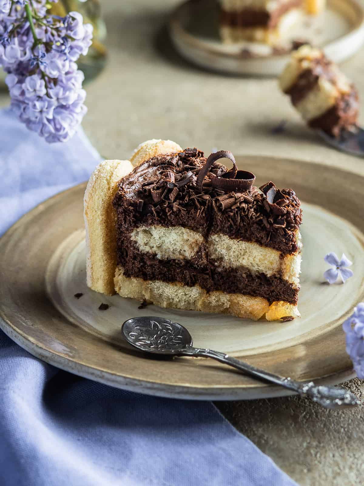 A single slice of Charlotte au chocolat on a dessert plate 