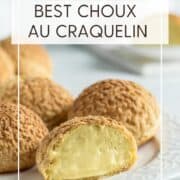 Choux au craquelin filled with French pastry cream on a dessert plate: Pin with text.
