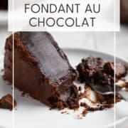 Slice of fondant au chocolate on a dessert plate: Pin with text.