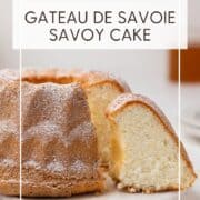 Sliced biscuit de Savoie on a serving board: Pin with text.
