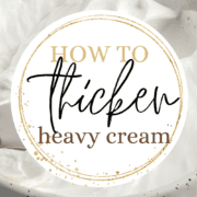 Thickened heavy cream in a ceramic bowl with a spoon. Overlying text.