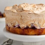 Louise cake on a serving cake stand.