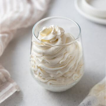 Mascarpone frosting piped in a glass