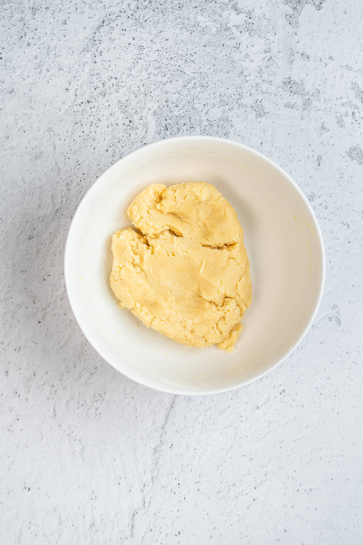 Short crust pastry in a bowl.