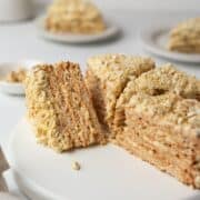 Sliced cake sans Rival on a serving platter.