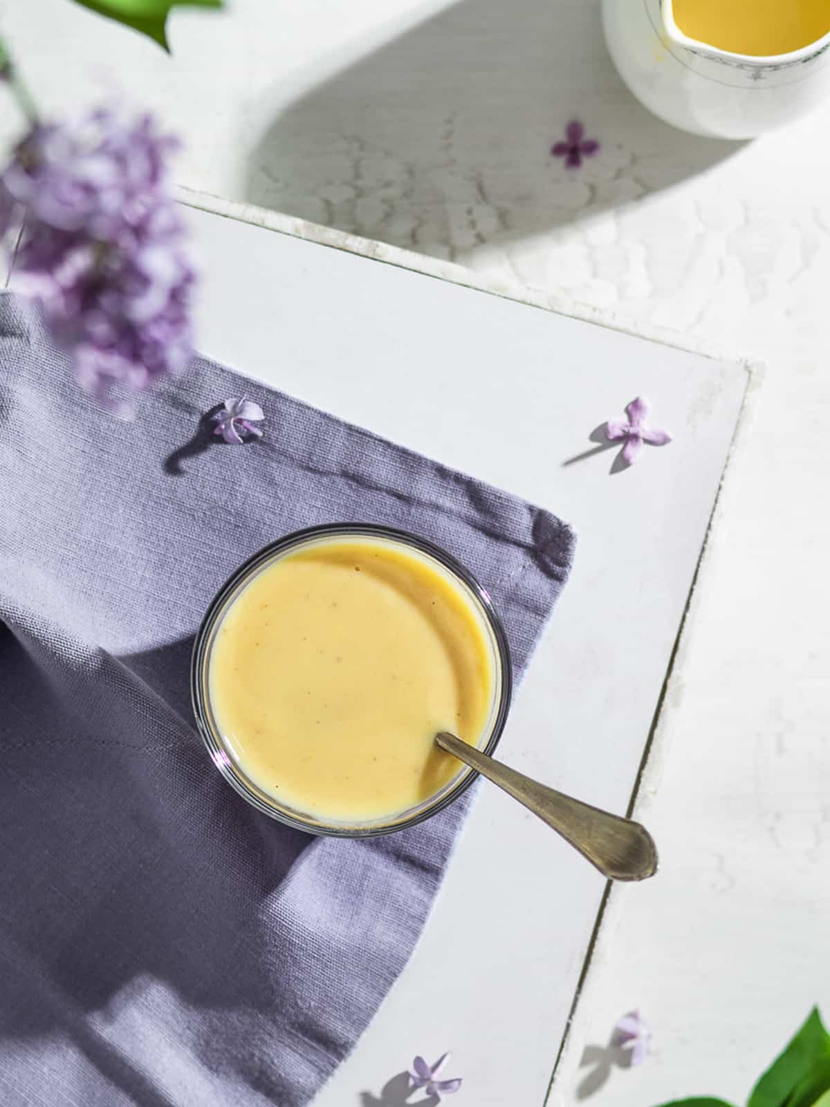 Creme Anglaise served in a glass.