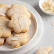 Sweetened condensed milk cookies on a white dessert plate.